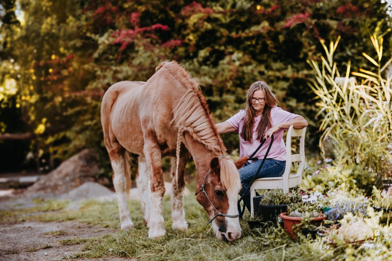 Reittherapie mit Kind auf dem Pferd